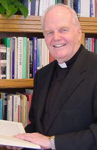 Rev. Charles L. Currie, S.J.