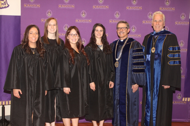 Frank J. O’Hara Awards for General Academic Excellence were presented to members of The University of Scranton’s class of 2017 with the highest GPA in each of the University’s colleges at Class Night on campus. From left: O’Hara Award recipients Jessica Marie Signore, Alexandra C. Brennan, Shannon N. Herrmann and Shannon H. McKenna; University of Scranton President Kevin P. Quinn, S.J.; and Joseph Dreisbach, Ph.D., interim provost and senior vice president for academic affairs.