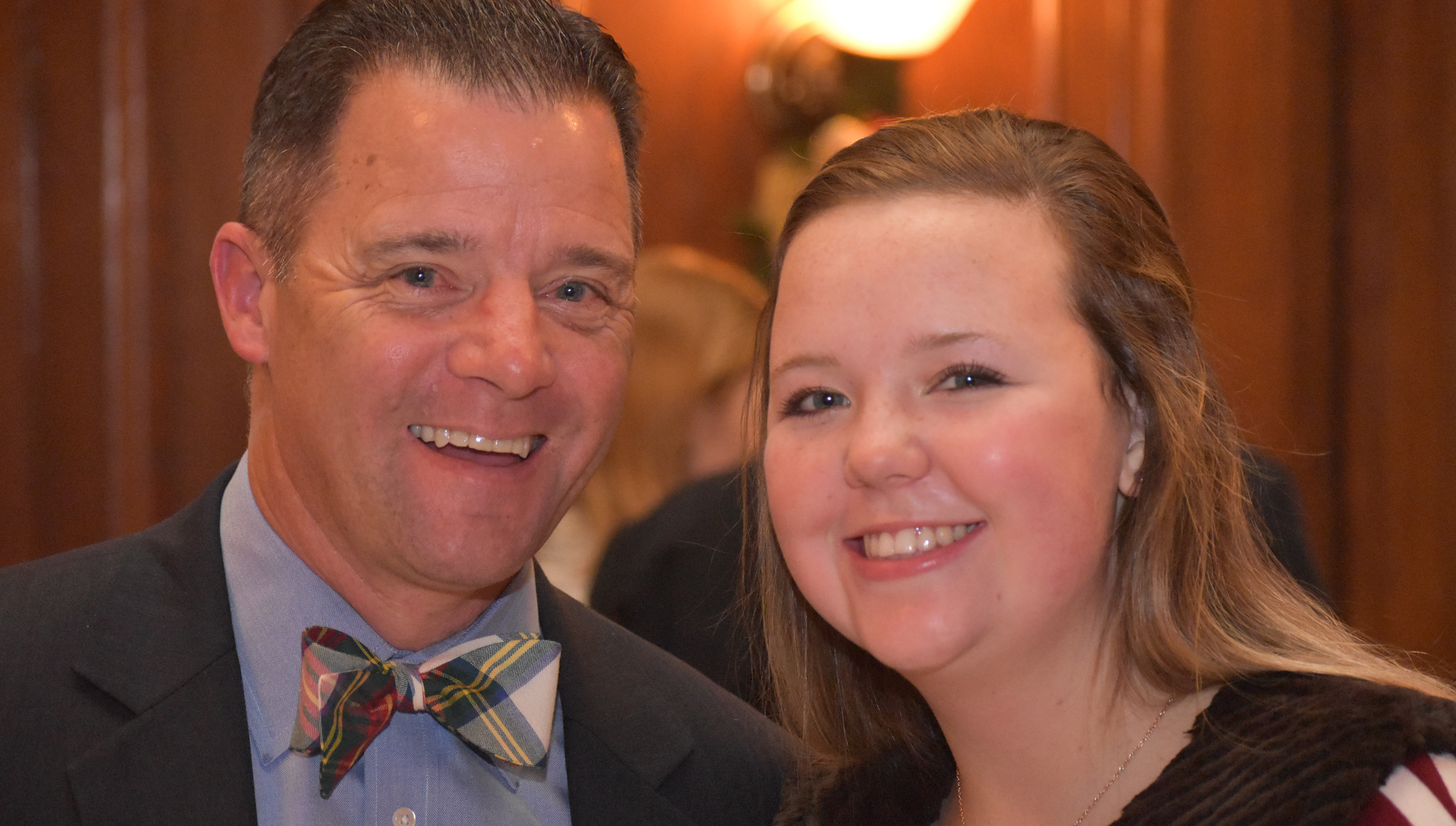 Chris Flynn '90 and his daughter Maggie enjoy the festivities at The Army and Navy Club. 