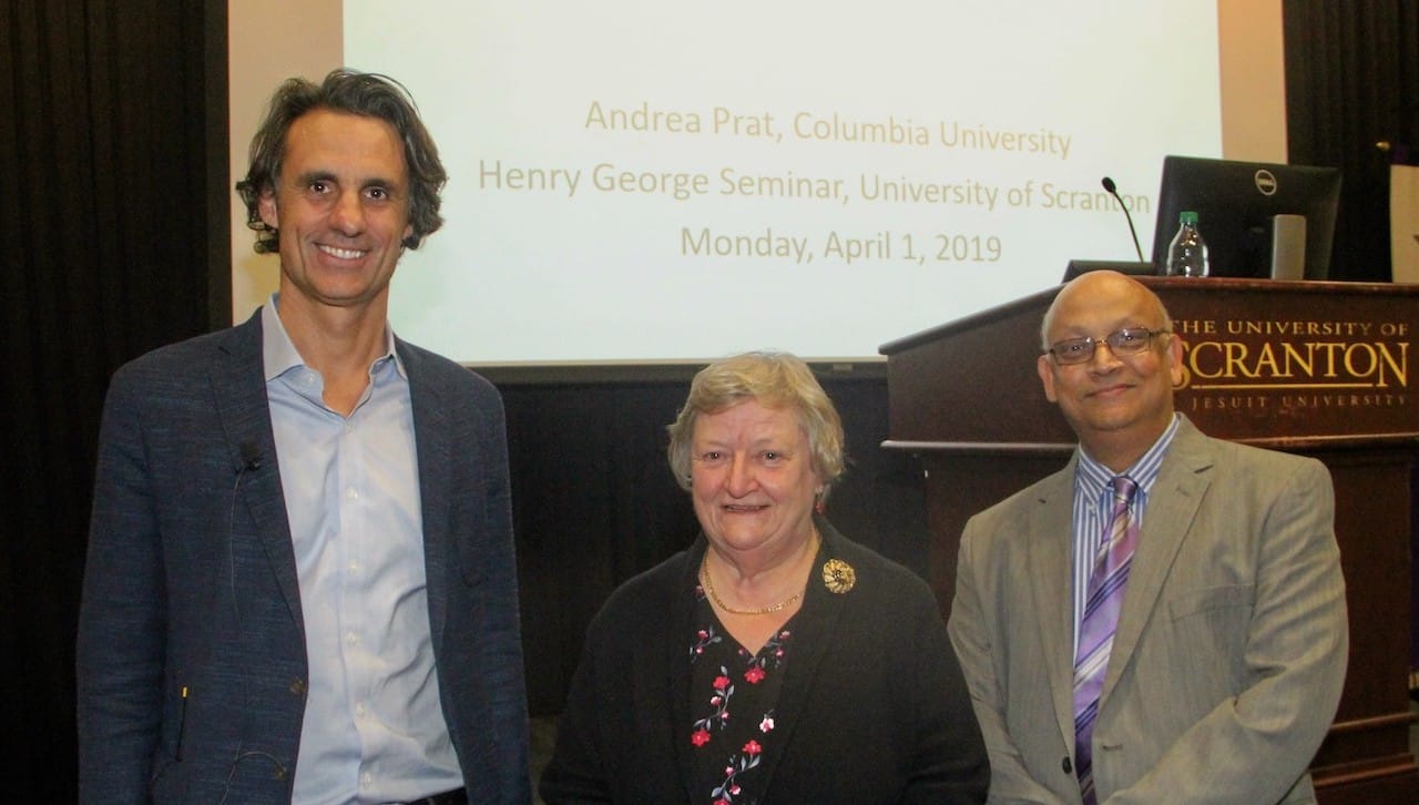 Andrea Prat, Ph.D., professor of economics from Columbia University, presented the The University of Scranton’s Henry George Seminar on campus in April. Pictured at the presentation are, from left, Dr. Prat and University of Scranton economics professors Susan Trussler, Ph.D., and Satyajit Ghosh, Ph.D.