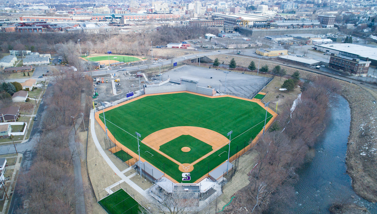 The University of Scranton announced the names of playing fields at The Kevin P. Quinn, S.J., Athletics Campus. The multi-purpose field will be named Robert and Marilyn Weiss Field in honor of the class of 1968 graduate and University Trustee and his wife. The baseball field will be named Charles J. Volpe Family Field, a name chosen by Charles (Chuck) Volpe Jr., Esq. ’82 and his wife, Ellen, in honor of the late Charles J. Volpe Sr. ’61 and his children and grandchildren who are graduates of the University. The softball field will be named Magis Field, a name chosen by former University Trustee Dennis J. McGonigle ’82 and his wife, Rachel.