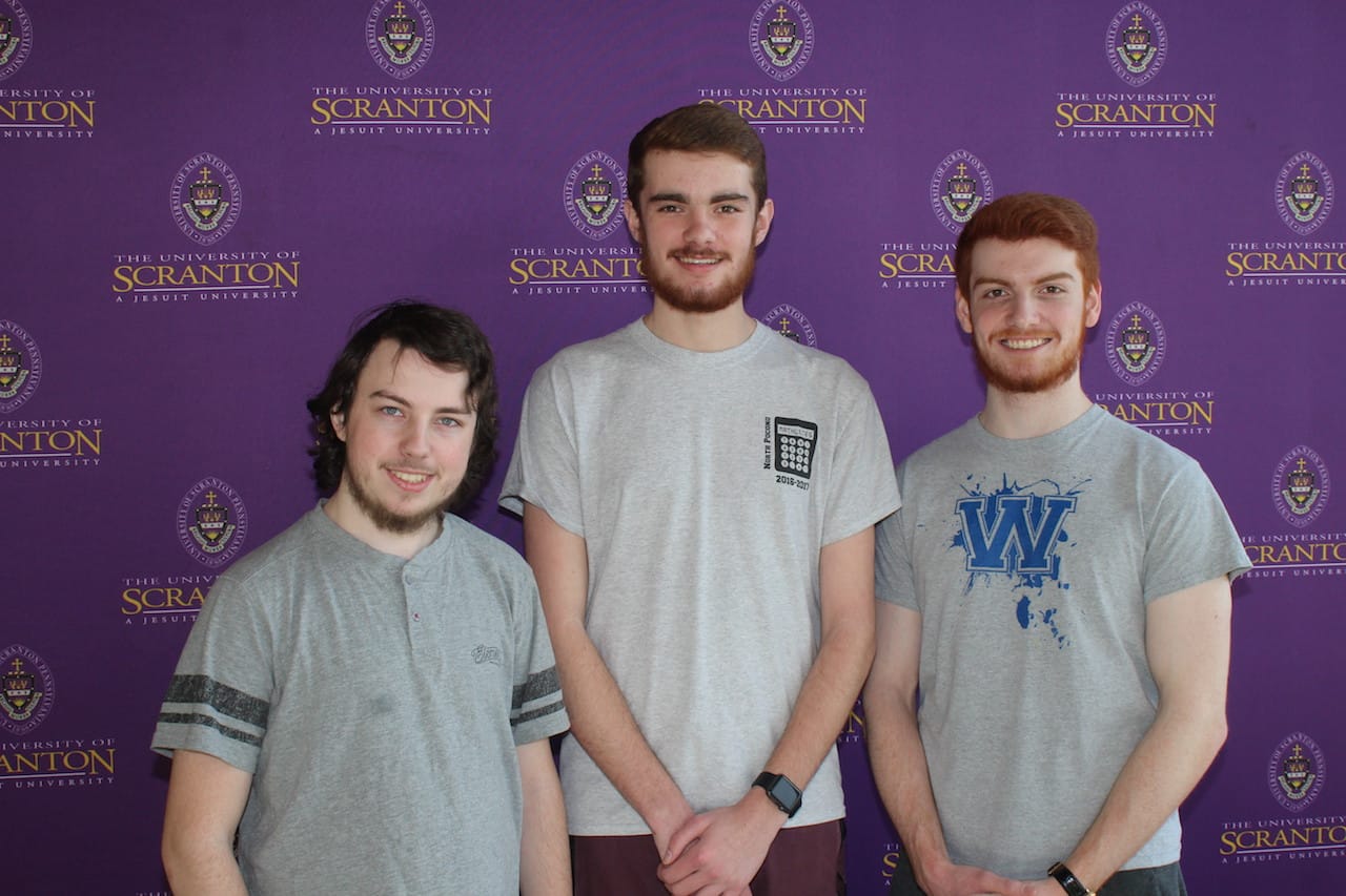 North Pocono students won second place honors in The University of Scranton’s annual Computer Programming Contest. From left: North Pocono students Zach Hercher and Will Thomas; and Sean McTiernan, Scranton, a sophomore at The University of Scranton majoring in computer science. Robert Deremer, business education teacher and team coach, was absent from the photo.