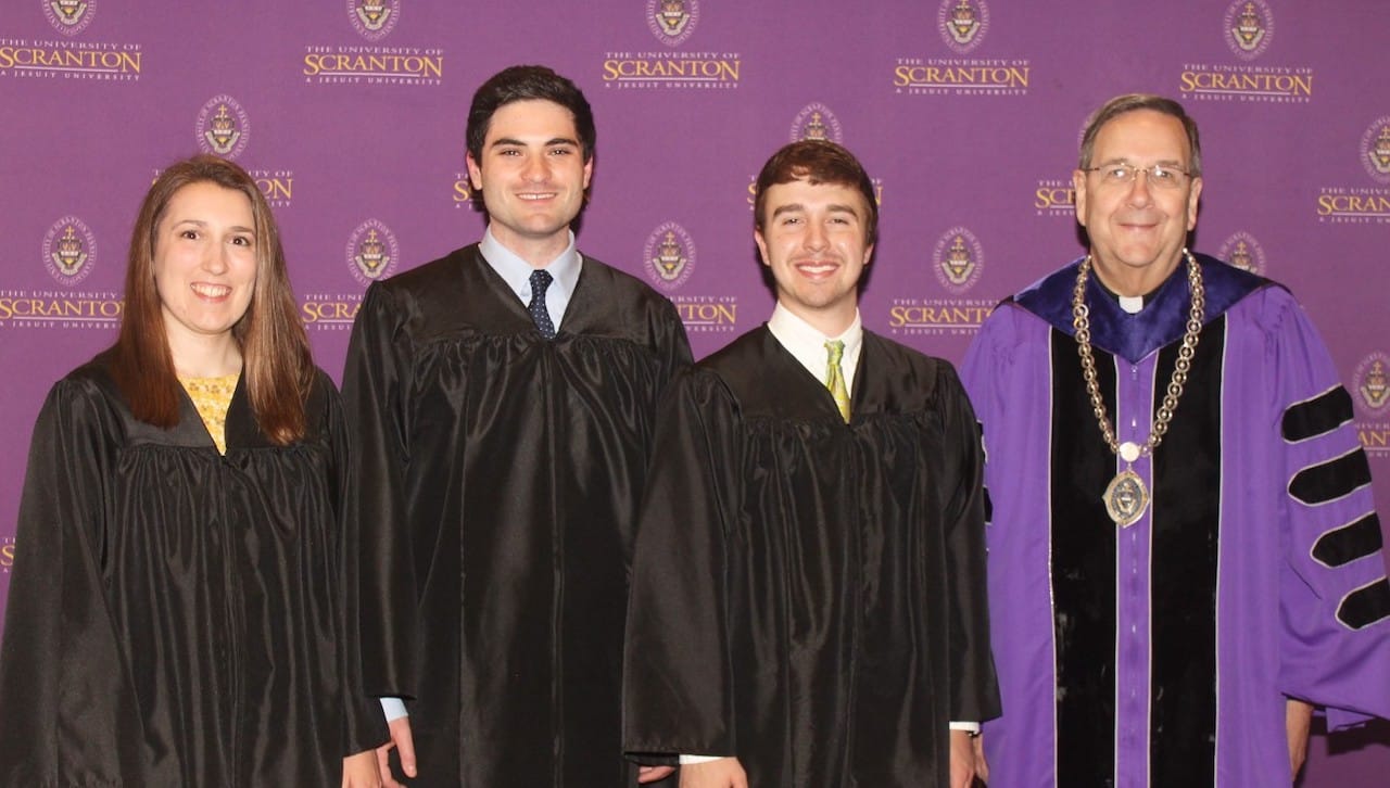 Frank J. O’Hara Awards for General Academic Excellence were presented to members of The University of Scranton’s class of 2018 with the highest GPA in each of the University’s colleges at Class Night on campus. From left: O’Hara Award recipients Sarah N. Jones, Patrick A. Tuzzo and Zachary P. Fiscus; and Rev. Herbert B. Keller, S.J., University of Scranton Interim President.