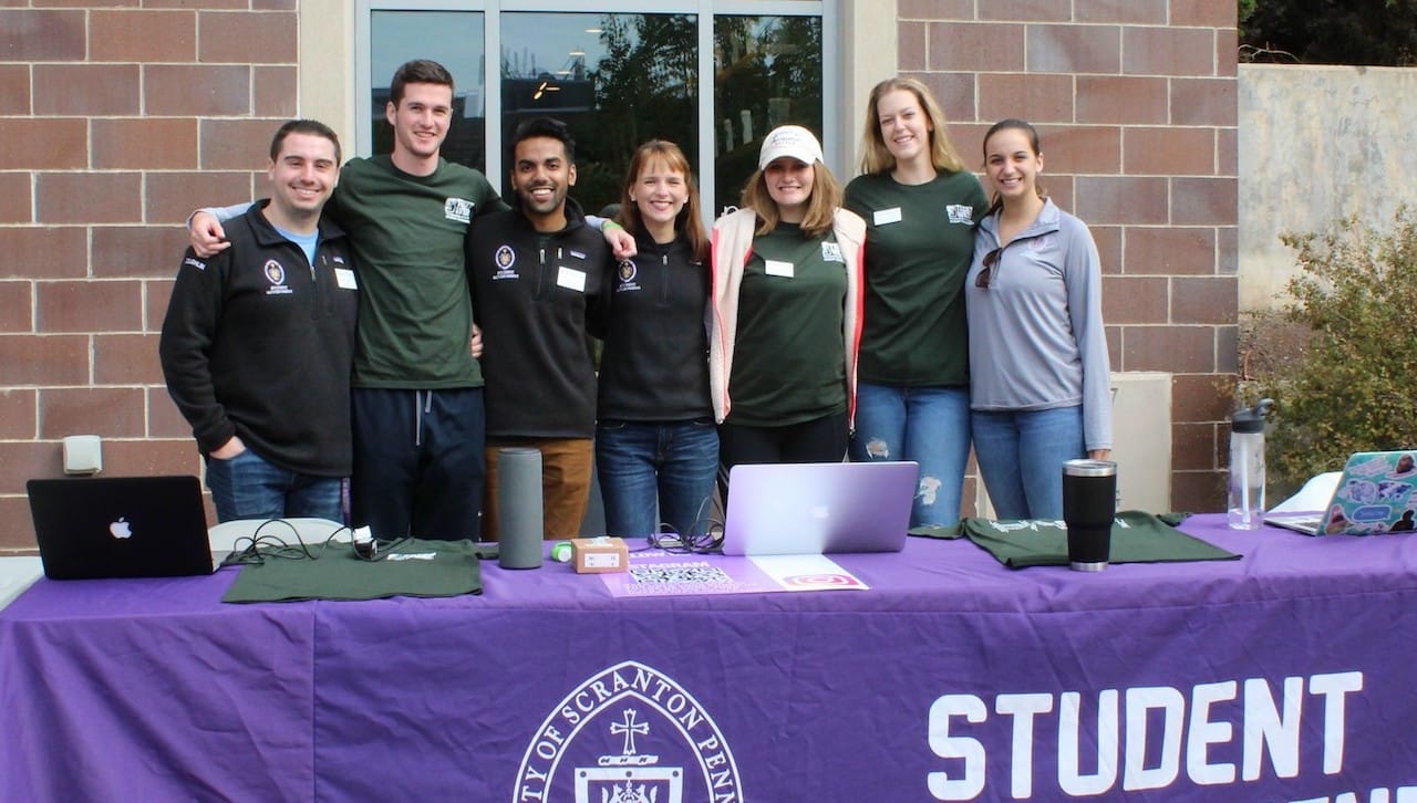 Student Government officers helped organize the hundreds of University students who participated in this semester’s Street Sweep are, from left: Matthew Coughlin, president; Jack Prendergast, director of technology; Fahad Ashraf, vice president; Madalyne Sunday, director of communications; Paige Nonnenmacher, executive treasurer; Marlene Geerinck, executive secretary; and Kimberly Barr, chief of staff.
