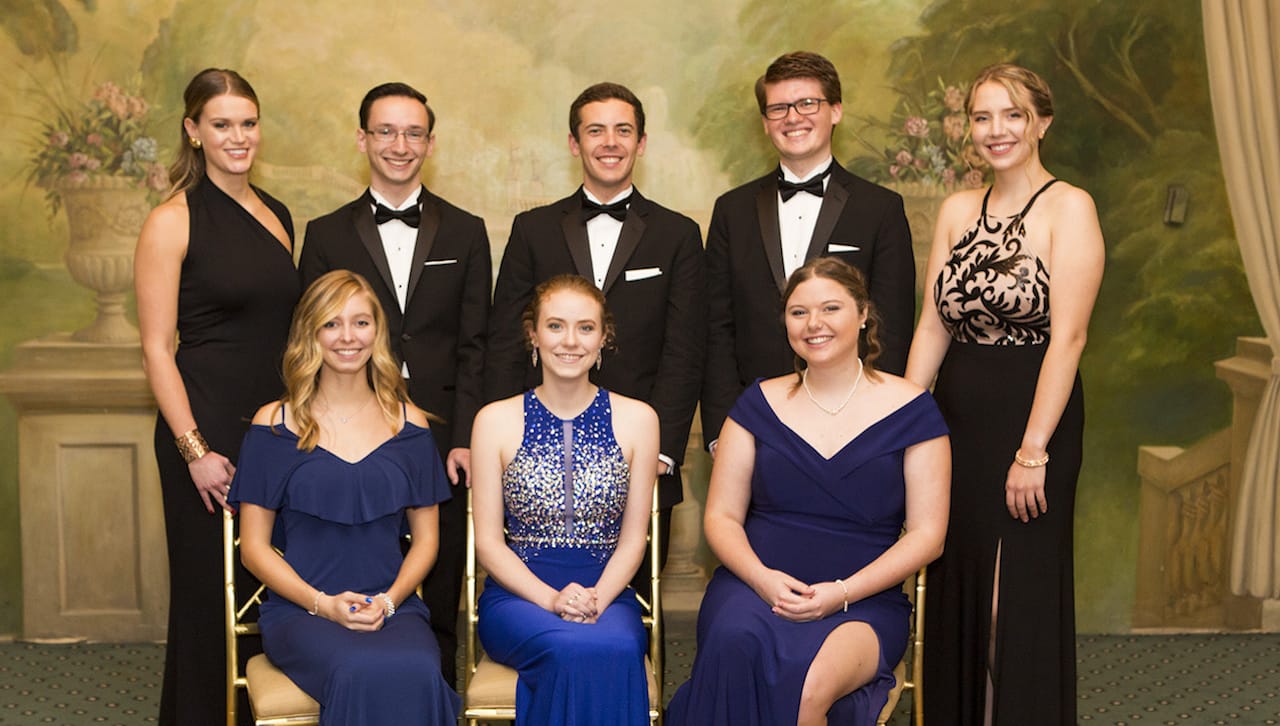Presidential Scholars of The University of Scranton’s class of 2019 attended the President Business Council’s 17th Annual Award Dinner at The Pierre. Proceeds from the annual dinner support the University’s Presidential Scholarship Endowment Fund. Seated, from left: Kellie Smigel, Blairstown, New Jersey, an exercise science major; Sara Wierbowski, Owego, New York, a neuroscience and philosophy double major in the Special Jesuit Liberal Arts Honors Program and the undergraduate Honors Program; and Sarah Laga, Westbury, New York, an international studies and philosophy double major in the Special Jesuit Liberal Arts Honors Program. Standing, from left: Mia Woloszyn, Madison Township, a biology major; Robert McGowan, Scranton, a psychology and philosophy double major in the Special Jesuit Liberal Arts Honors Program; Peter Kulick, Pittston Township, an electrical engineering major; Joseph Delmar, Flourtown, a biophysics and philosophy double major in the Special Jesuit Liberal Arts Honors Program and the undergraduate Honors Program; and Megan Steinmetz, Vestal, New York, a nursing major in the undergraduate Honors Program. Absent from photo is Presidential Scholar Samuel Morano, Clarks Summit, a biology major. 