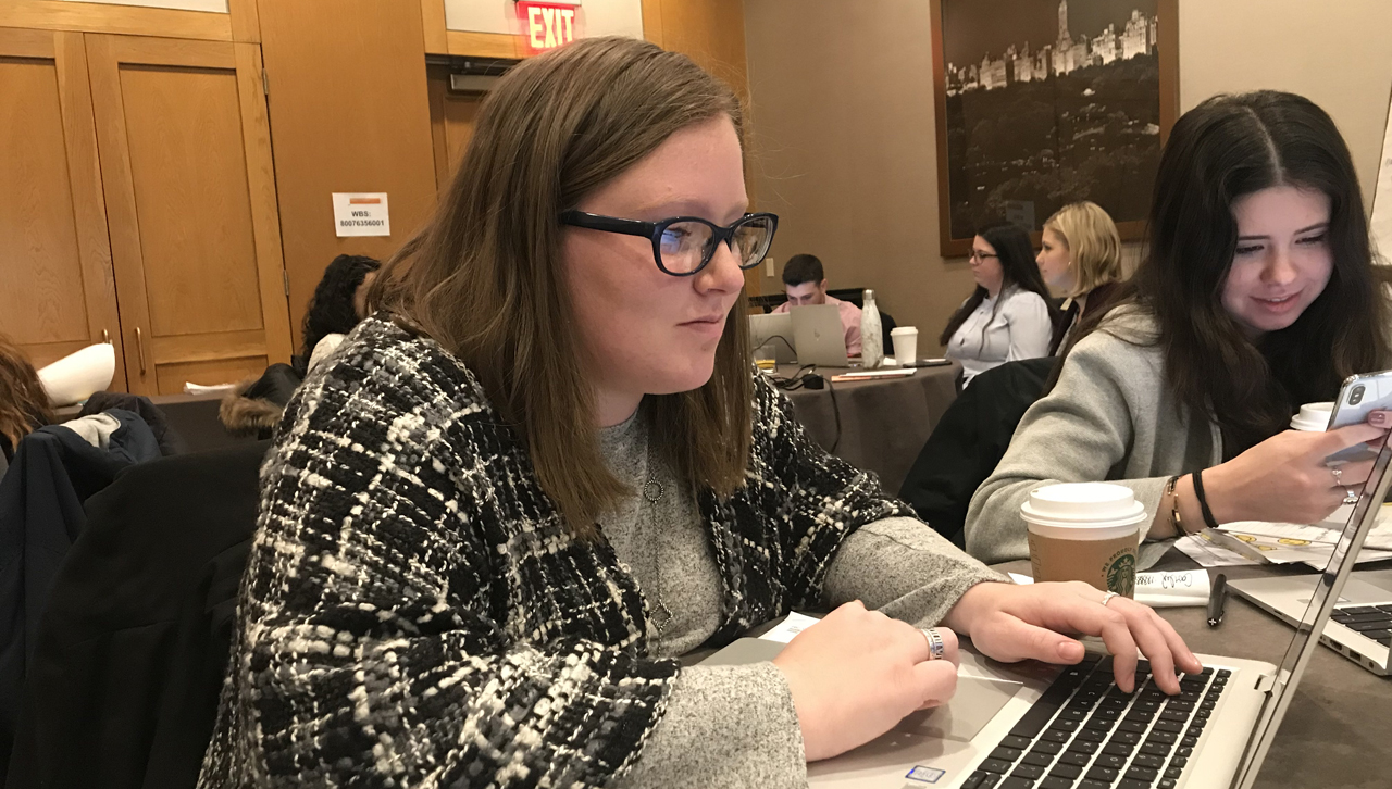 Alexandra Turner '19 learning how to audit clients during her training week.