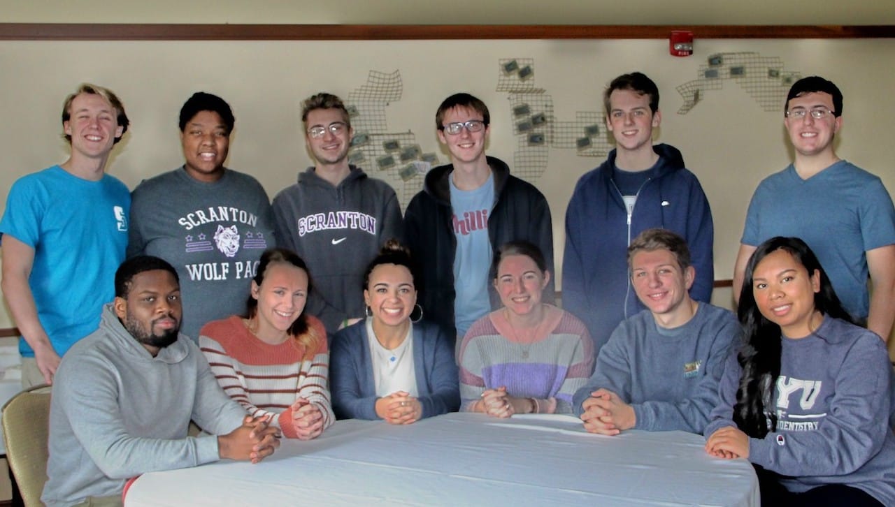 The University of Scranton celebrated its 16 current Maguire Scholars at a gathering on campus recently. Attending the event are, first row, from left, Maguire scholars Zachary Thomas, Sonni Mazzone, Cianna Kisailus, Catherine Stapf, Jakob Hodlofski and Sothea MacBain. Second row: Maguire scholars Stas Postowski, Kimberly Baxter, Brian Price, Brayden Hood, Patrick Joyce and Andrew Wisniewski. Absent from the photo are Maguire scholars Christiana Cruz-Council, Daniel McNulty, Madison Nord and Alex Vallejo.