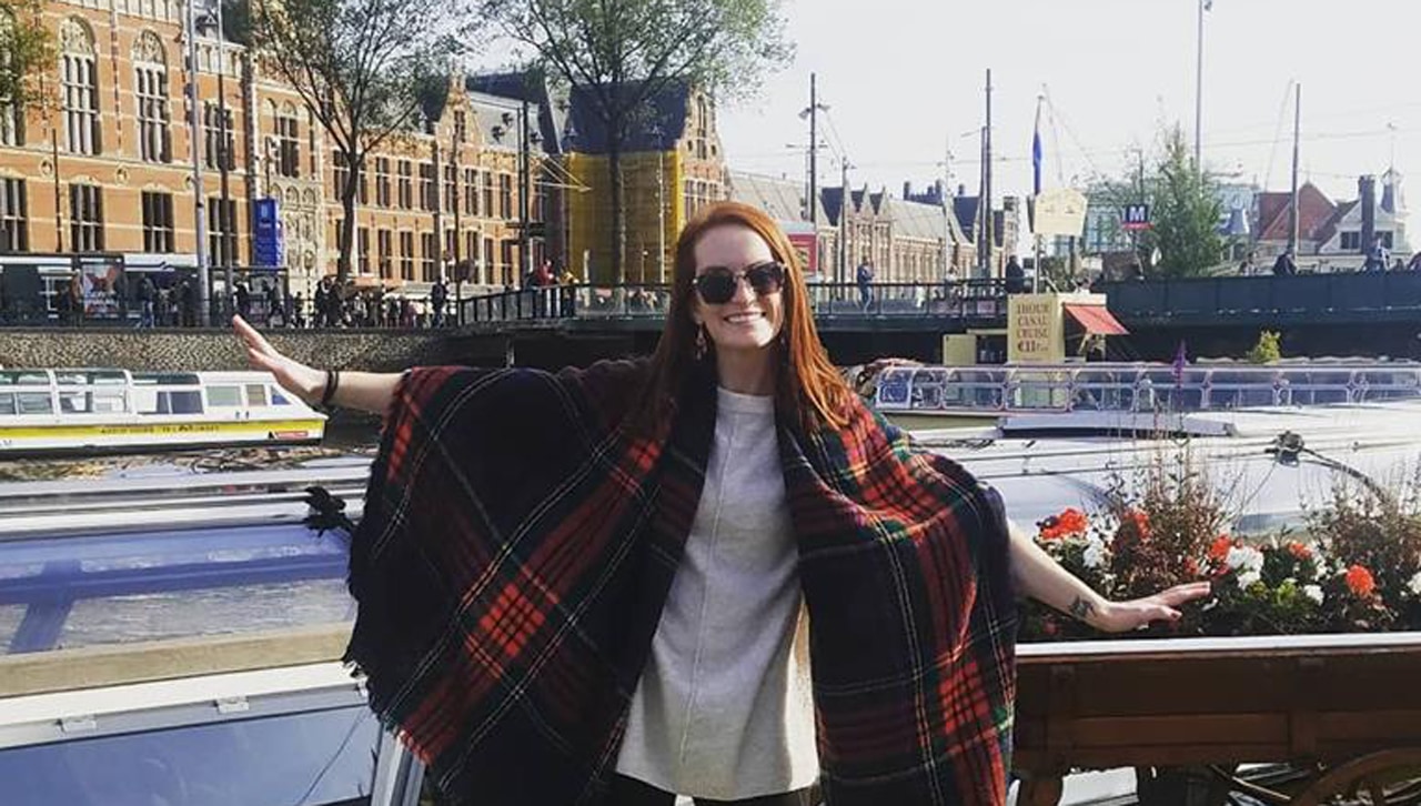 Elizabeth Steele in Amsterdam before a canal cruise tour.