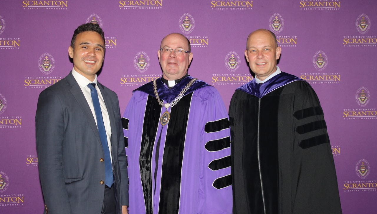 From left: class of 2019 Teacher of the Year award recipient Duane Armitage, Ph.D.; Rev. Scott R. Pilarz, S.J., president of The University of Scranton; and Jeff Gingerich, Ph.D., provost and senior vice president for academic affairs.