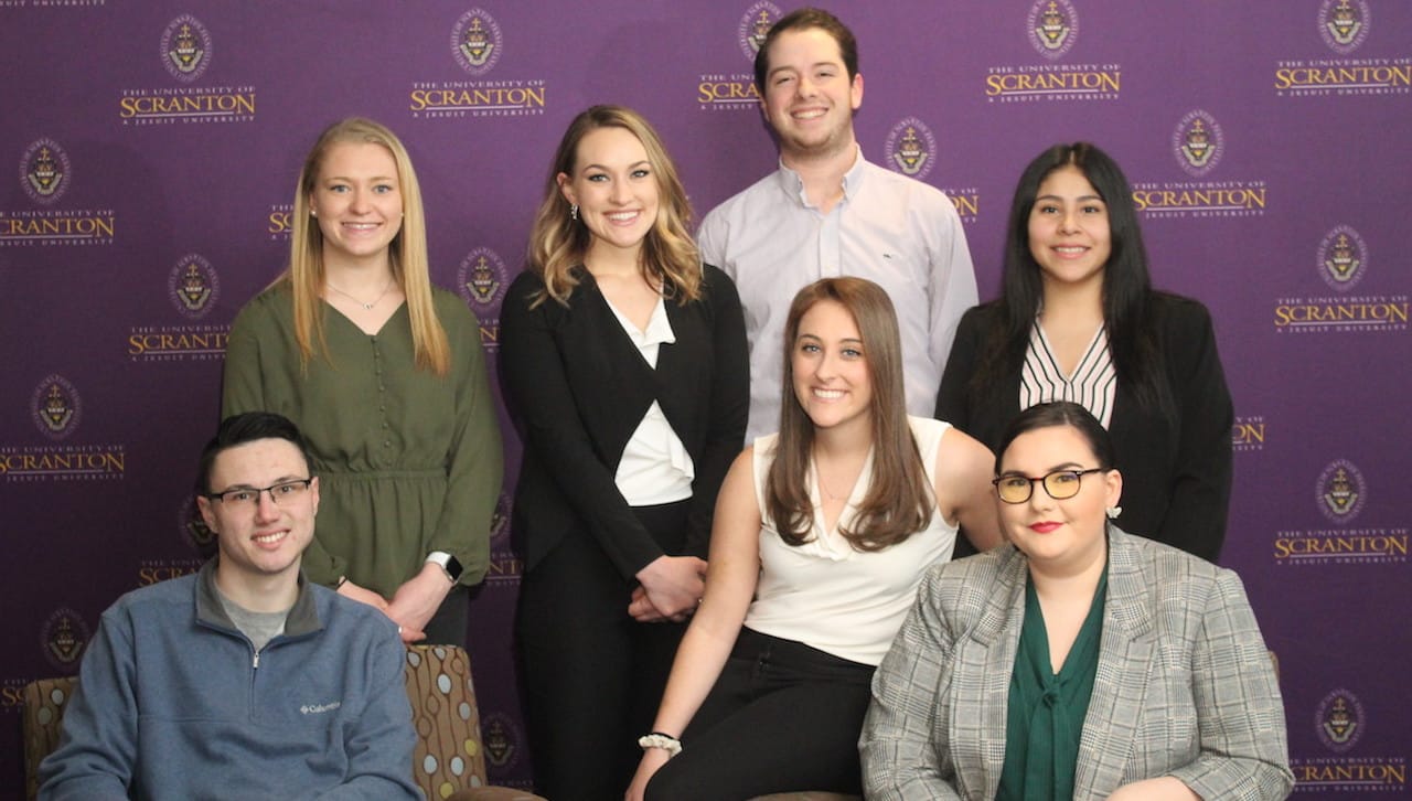 Seven University of Scranton students participated in the 2019 American Advertising Federation’s National Student Advertising Competition. Seated from left: Anthony Manno, Kaitlyn Murphy, and Allison Northrop. Standing: Emily Benton, Sabrina Talarico, Brian Nieto and Nina Abate.