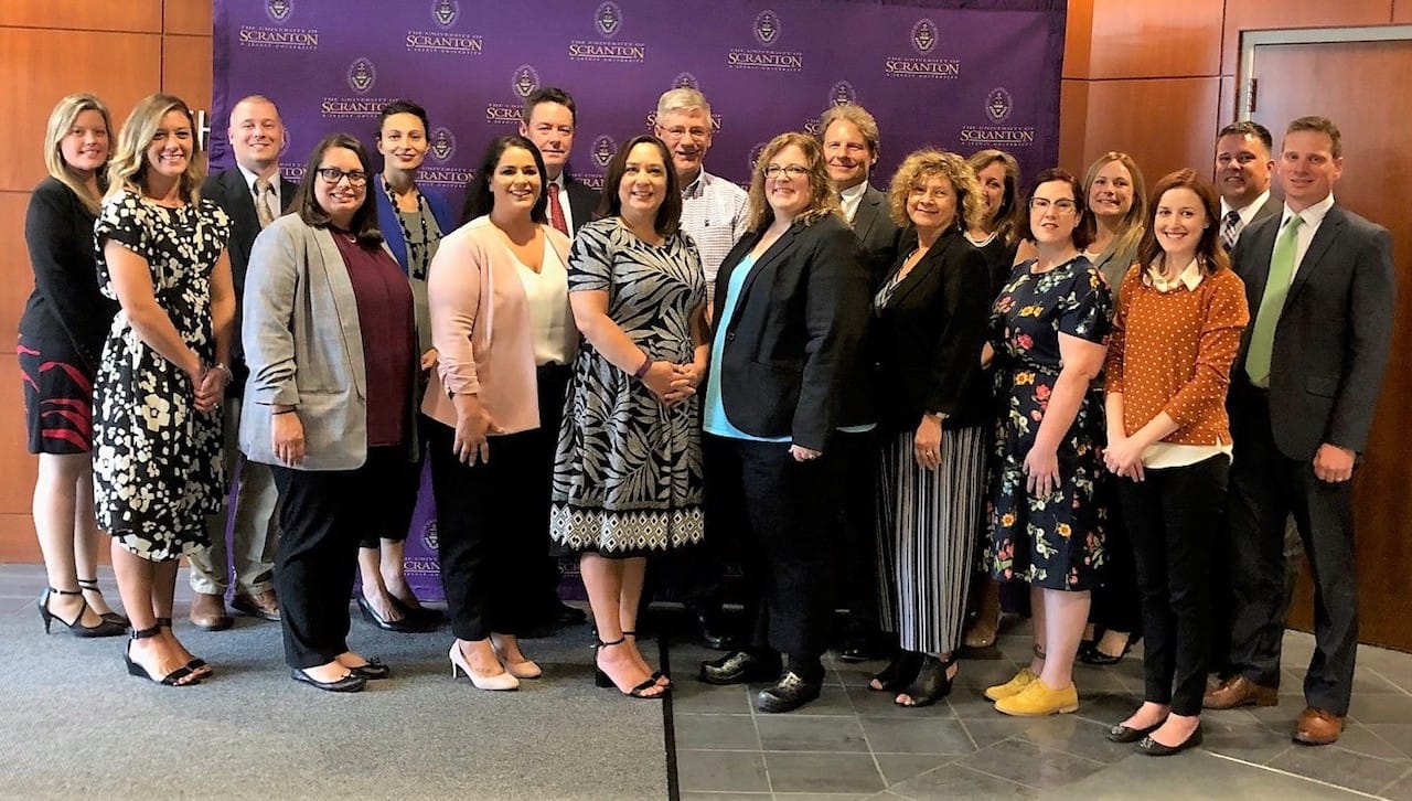 The third cohort of students in The University of Scranton’s Nonprofit Leadership Certificate Program began the program for 2019-2020. First row, from left: Chelsea Chopko; Jessica Wallo; Helayna Szescila; Janine Fortney; Anna Faramelli; Cathy Colangelo; Mary-Pat Ward; Amber Loomis; and Jesse Ergott, Nonprofit Leadership Program faculty member. Back row: Megan Mould; Ron Prislupski; Julie Schumacher Cohen, program advisory board member and director of community and government relations at the University; Douglas Boyle, D.B.A., director of the Nonprofit Leadership Program at Scranton; Edward Steinmetz, program advisory board member and senior vice president for finance and administration at the University; Ben Payavis; Maria Montoro Edwards, program advisory board member; Nicole Morristell; and Kurt Bauman, Nonprofit Leadership Program faculty member. Absent from photo were Michael Brown, Ginny Crake and Julianne Cucura.