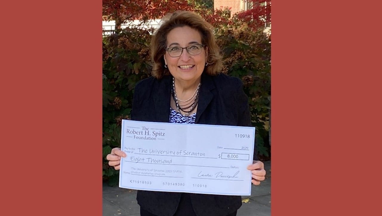 The University of Scranton received a $8,000 grant from the Robert H. Spitz Foundation to support its SPARK Program, a week-long summer camp for area teens designed to foster teamwork, self-esteem and acceptance of others through interactive educational and outdoor activities. Pictured is Patricia Vaccaro, director of the University’s Center for Service and Social Justice, who founded SPARK with Scranton alumnus Danny Marx, a Scranton graduate and teacher at Scranton Prep. The Scranton Area Community Foundation serves as the administrator of the Robert H. Spitz Foundation.