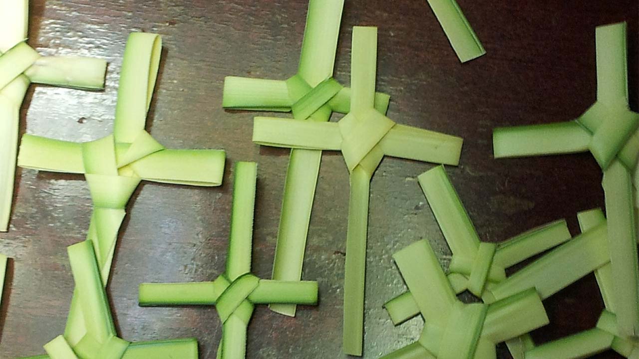 Pieces of palm formingcrosses. 