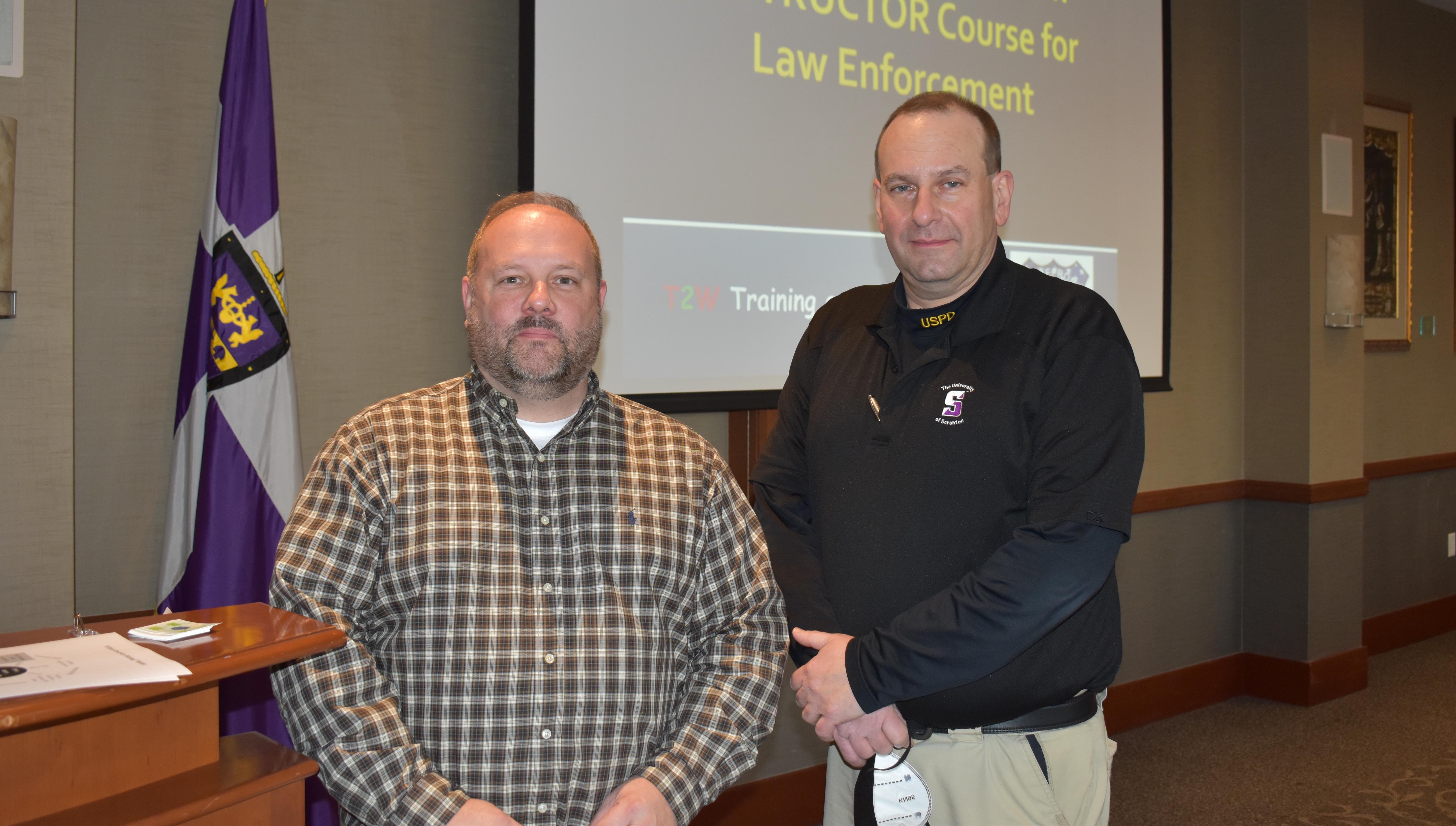 From left, University Police Policy And Compliance Manager David Kostiak and University Police Sergeant Joseph Laguzzi participate in "Practical De-Escalation and the Critical Decision Making Model," a free workshop for law enforcement officers provided by University Police and funded through a grant from the Scranton Area Community Foundation.