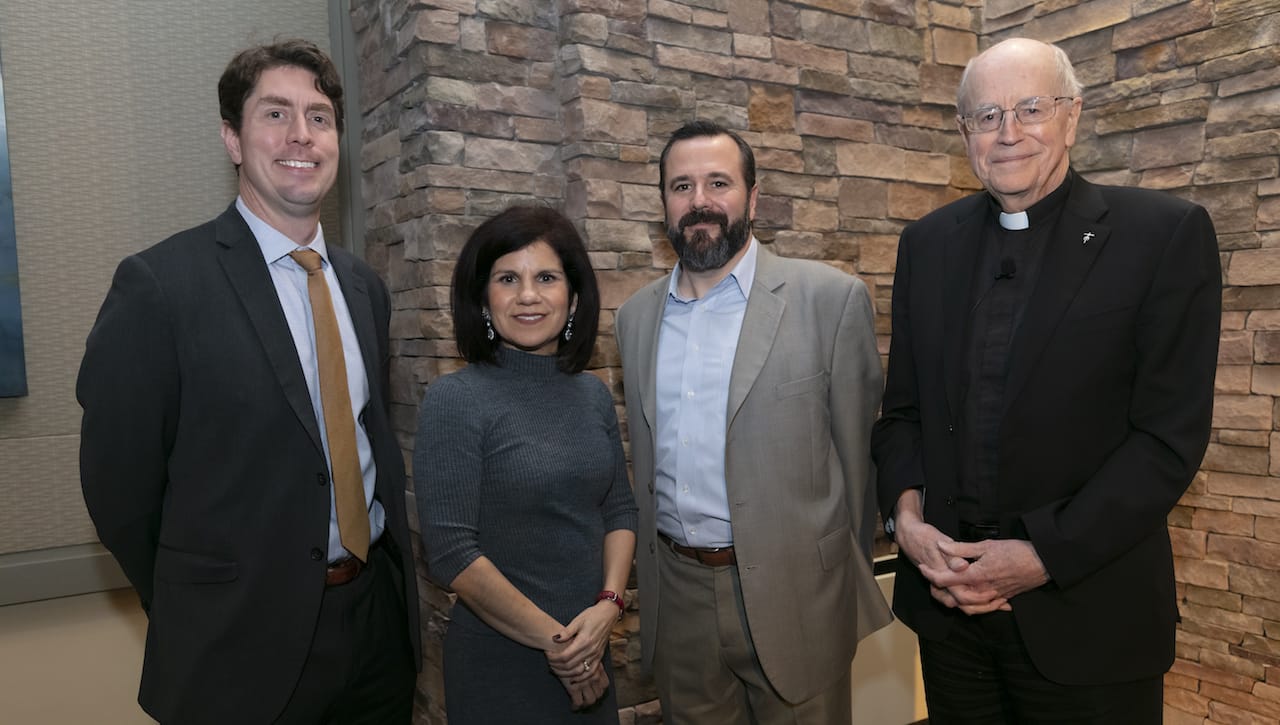 From left: David Dzurec, Ph.D., associate dean of the College of Arts and Sciences; Michelle Maldonado, Ph.D., dean of the College of Arts and Sciences; Ryan Sheehan, J.D., assistant director of the Jesuit Center; and guest speaker Rev. James L. Heft, the author of “The Future of Catholic Higher Education: The Open Circle.”