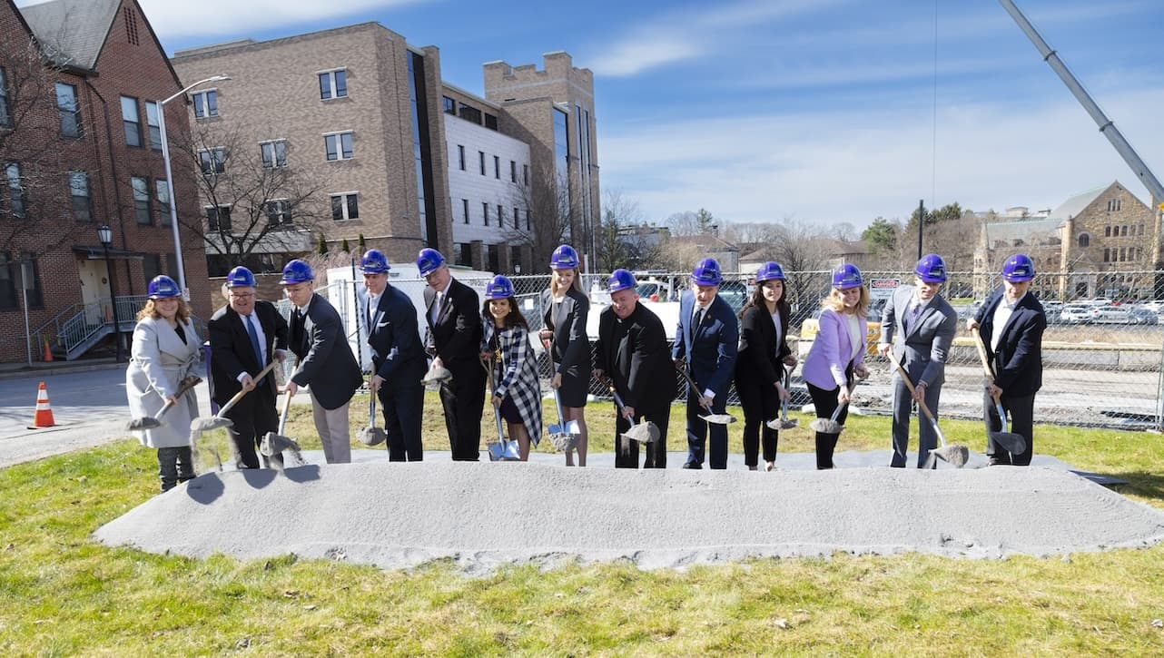 University of Scranton officially broke ground for new four-story, roughly 90,000 square-foot center for workforce development, applied research and outreach at a ceremony on April 8. From left are: Laura Gilette-Mills, Hemmler and Camayd architects; University trustees John P. (JP) Sweeney and Vincent Reilly, Esq., chair; John Norcross, Ph.D., Distinguished Professor of Psychology at Scranton; Ed Steinmetz, senior vice president for finance and administration; Michelle Maldonado, Ph.D., provost and senior vice president for academic affairs; Scranton Mayor Paige Gebhardt Cognetti; Rev. Joseph G. Marina, S.J., president of The University of Scranton; U.S. Rep. Matt Cartwright; University student Maria Manno, a biochemistry, cell and molecular biology major from Blue Bell; Lauren Rivera, J.D., M.Ed., vice president for student life and dean of students; Michael Jenkins, Ph.D., professor and chair of the University’s Department of Criminal Justice, Cybersecurity and Sociology; and Ken Ruby, Hemmler and Camayd architects.
