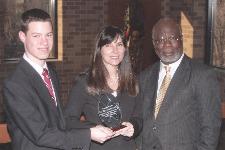 Rose Sebastianelli, Ph.D., was chosen as the Kania School of Management Professor of the Year by The University of Scranton’s Business Club. From left are University of Scranton junior Frederick T. Fuchs, secretary of the Business Club; Dr. Sebastianelli; and Michael O. Mensah, Ph.D., dean of the Kania School of Management, The University of Scranton.