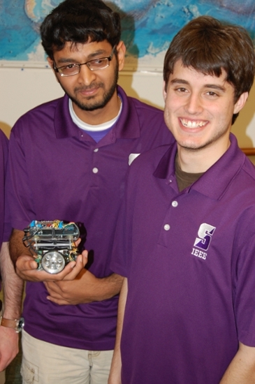 From left, University of Scranton seniors Hardik Patel and Stefan Bossbaly won first place in the Micromouse Robotics Competition at the 2014 Institute of Electrical and Electronics Engineers (IEEE) Region 2 Student Activities Conference. They were among the 12 Scranton students that participated. Students at the competition represented Bucknell University, Drexel University, Ohio State University, Penn State University and West Virginia University, among others. 