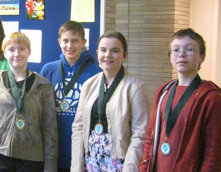 From left: the winners of The University of Scranton and Pennsylvania American Water Essay Contest for seventh and eighth grade students are, from Mid Valley Secondary Center, Eden Rozing, first place; John Piorkowski, honorable mention; and Samantha Shelesky, second place; and from North Pocono Middle School, Brad Williams, third place.