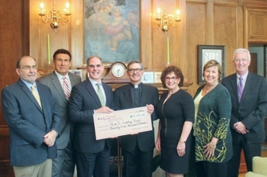 AllOne Foundation and Charities awarded a $75,000 grant to The University of Scranton’s Edward R. Leahy Jr. Center Clinic for the Uninsured. From left are: AllOne board members John Menapace and  Frank Apostolico; John Cosgrove, AllOne executive director; University of Scranton President Kevin P. Quinn, S.J.; Andrea Mantione, director of the University’s Leahy Community Health and Family Center; Debra A Pellegrino, Ed.D., dean of the University’s Panuska College of Professional Studies; and Gary Olsen, vice president for University advancement.
