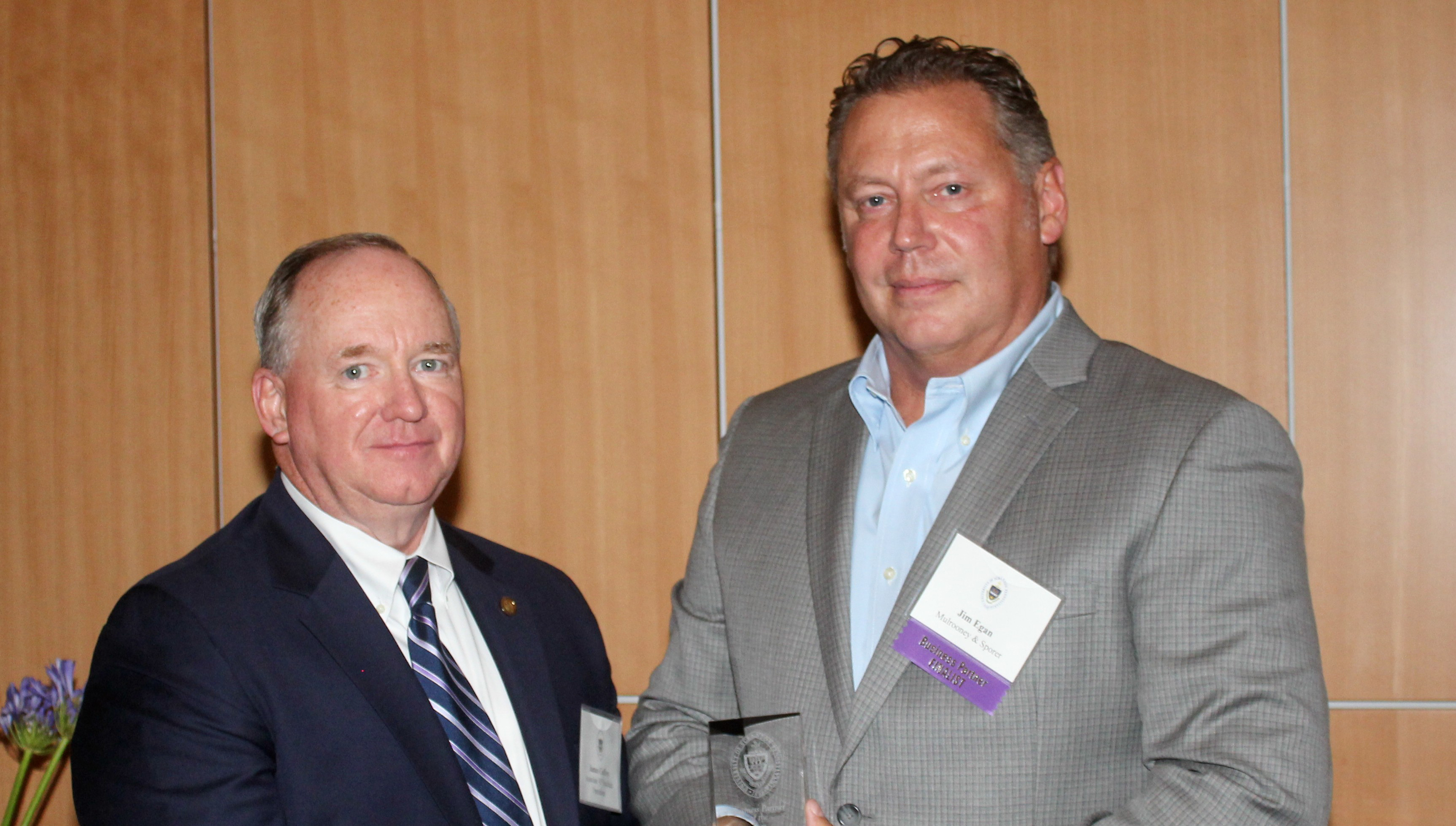 From left, University Associate Vice President for Facilities James Caffrey enjoys a moment with Mulrooney & Sporer Vice President Jim Egan at the Business Partner Appreciation Dinner.