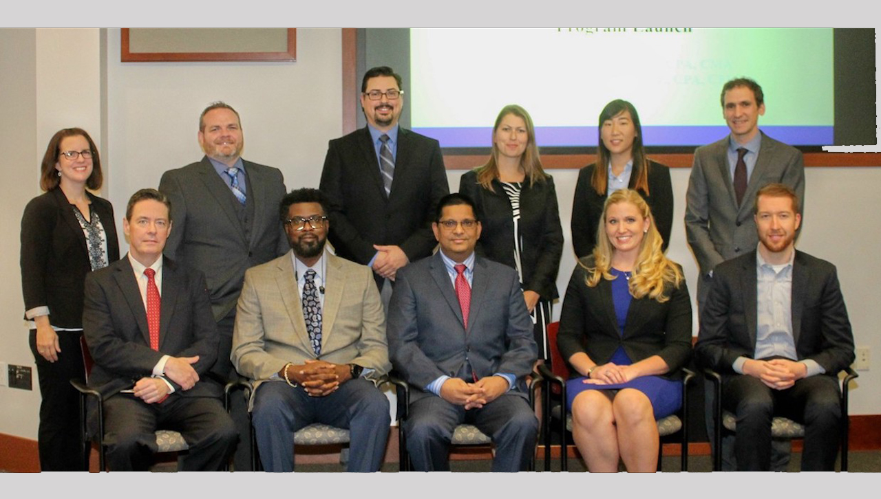 The University welcomed to campus the first cohort of students enrolled in the new doctor of business administration (DBA) program. First row, from left: Douglas M. Boyle, DBA, associate professor, accounting department chair and DBA program director; and DBA students Anthony Fulmore, Joy Chacko, Amanda Marcy and Patrick O’Brien. Back row: DBA students Heather Losi, Ronald Parker, Marcus Burke, Elena Isaacson, Stephanie Lee and Daniel Gaydon. Absent from the photo are DBA students Craig Gallagher and Katheryn Zielinski.