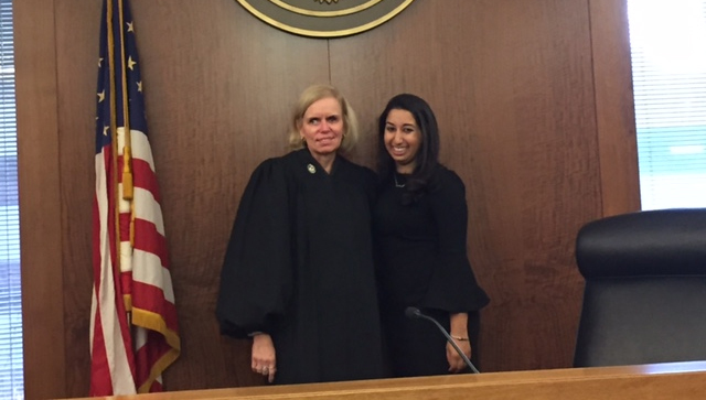 The Honorable Lynne A. Sitarski '86, US Magistrate Judge for the United States District Court, administers the Oath of Admission as an attorney to alumna Mara I. Smith '13.