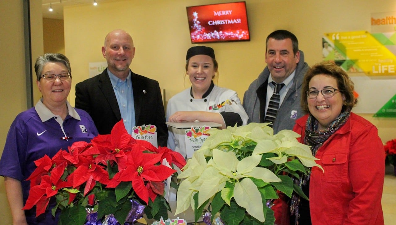 The University of Scranton will hold its 9th annual Community Christmas Day Breakfast on Monday, Dec. 25, from 8 a.m. to 10:30 a.m. in the third-floor Fresh Food Company of the DeNaples Center on campus. Planning the event are, from left: Kathy Boots, dining services/ARAMARK; Joseph Boyd, general manager, dining services/ARAMARK; Cassandra Yanchak dining services/ARAMARK;Michael Judge, assistant director of facilities operations at the University; and Pat Vaccaro, director of the Campus Minstiries’ Center for Service and Social Justice at the University.