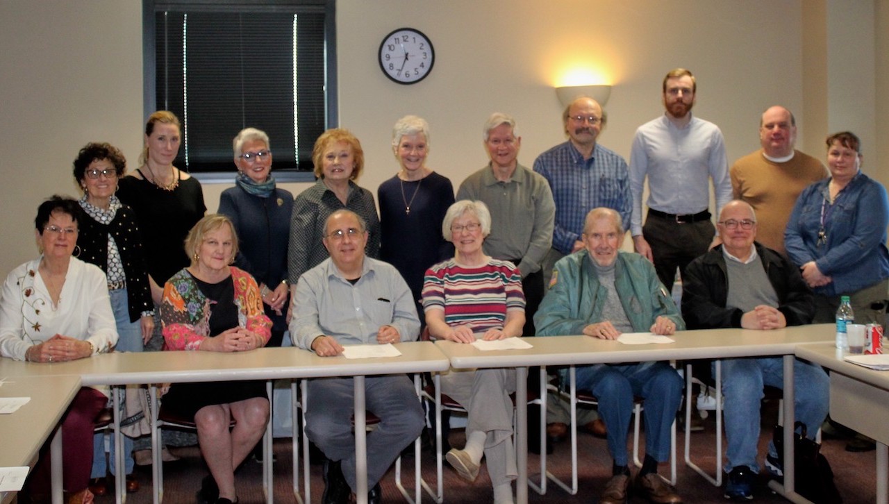 Committee members met to plan The University of Scranton’s Weinberg Memorial Library annual Book, Plant and Tag Sale, scheduled for Saturday and Sunday, April 28 and 29, in the Scranton Heritage Room on the fifth floor of the library.Seated, from left Geri Botyrius; Barbara Evans, circulation/access service clerk for the library; Michael Knies, co-chair and special collections librarian; Phyllis Reinhardt, co-chair; Brian McHugh; and Roy Domenico, Ph.D., professor of history. Standing: Marian Shambe; Kym Fetsko, administrative assistant for the library; Annmarie Fetsko; Kathy Belak; Carolyn Santiso; Alan Mazzei; Peter Tafuri; Ian O’Hara, serials clerk for the library; Kevin Kocur, interlibrary loan coordinator, and Mary Kovalcin, library systems coordinator.