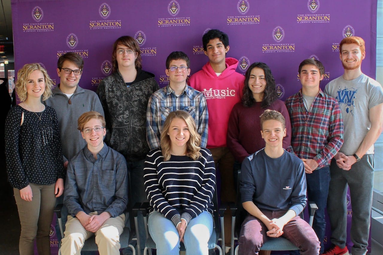 Abington Heights High School students participated in The University of Scranton’s annual Computer Programming Contest. Seated in first row, from left: Abington Heights students Clay Davis, Maddie Badalamente and Ryan Siebecker. Second row: Coach Amanda Jones; Abington students Greg Guditus, Liam Pitchford, Adam Traweek, Arjun Iyengar, Ari Wisenburn and Dominick DeSeta; and Sean McTiernan, Scranton, a sophomore at The University of Scranton majoring in computer science.