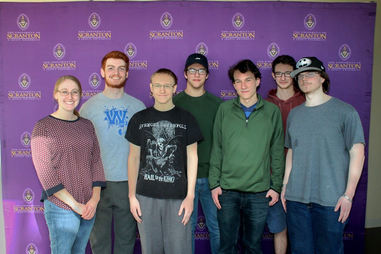 Delaware Valley High School students participated in The University of Scranton’s annual Computer Programming Contest. Seated in first row, from left: Coach Jessica Hubal; Delaware Valley students Andrew Hoopman, TQ Smith and Jared Wilson. Second row, from left: Sean McTiernan, Scranton, a sophomore at The University of Scranton majoring in computer science; and Delaware Valley students Aaron Loihle and Noah Irgang.