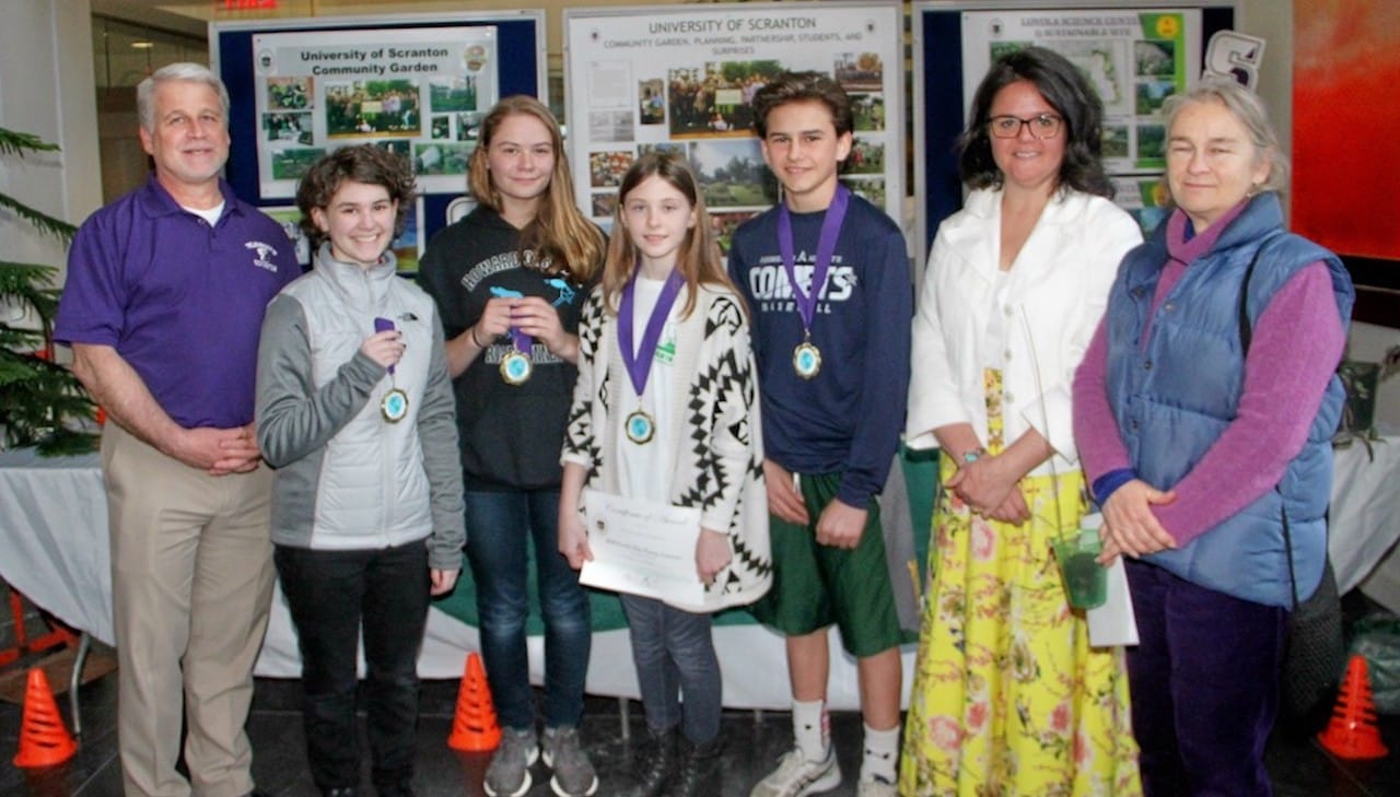 Elementary, middle and high school students won awards at this year’s University of Scranton Earth Day Essay Contest. From left: Mark Murphy, director of sustainability at the University; essay contest winners Rebecca Cruciani, ninth to 12th grade category, Scranton High School; Josephine Krokus, seventh grade, and Molly O’Boyle, special award for third and fourth grade, both from Howard Gardner MI Charter School; and Gavin Ross, eighth grade, Abington Heights Middle School; and Casie Berkhouse and Megan Wolfe from Howard Gardner MI Charter School. Absent from the photo was essay contest winner Lola Pulatova, sixth grade, from the Bay Academy in Brooklyn, New York.