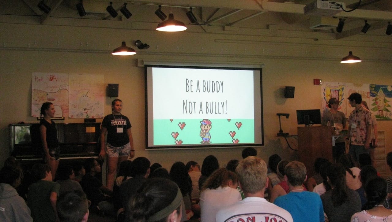 SPARK program participants gather around to hear University of Scranton and Scranton Preparatory School student mentors talk about bullying and how to overcome it.