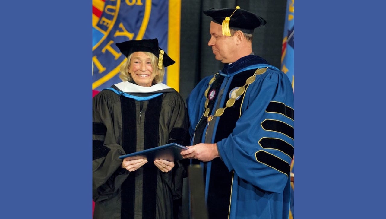 Members of the public and University community can read the work of American poet Mary Oliver at an “open reading” Tuesday, April 23, at 5:15 p.m. at the flag pole terrace on The University of Scranton’s Commons. The event will celebrate the work of the Pulitzer Prize-winning poet who passed away in January. Pictured are Oliver and University of Scranton President Rev. Scott R. Pilarz, S.J., who served as the president of Marquette University at the time in which she received an honorary degree from Marquette.