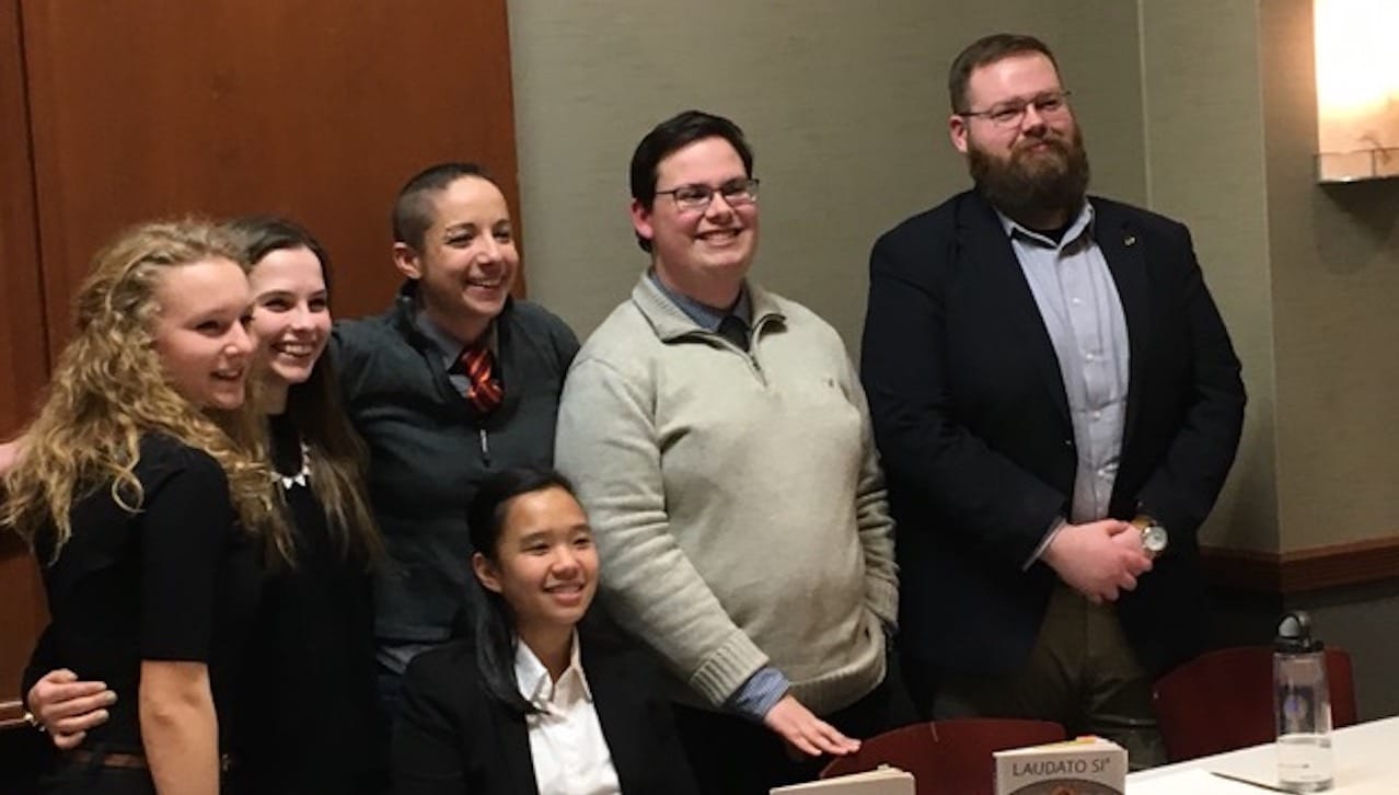 The work of five University of Scranton students was presented at the Sigma Tau Delta International Convention in St. Louis, Missouri, in March. Seated is University student Cara Charles. Standing, from left, are University students Phyllida Whittaker and Emily Carr; Billie Tadros, Ph.D., assistant professor of English and co-moderator of Sigma Tau Delta; and University students Matthew Criscione and David Rakauskas.