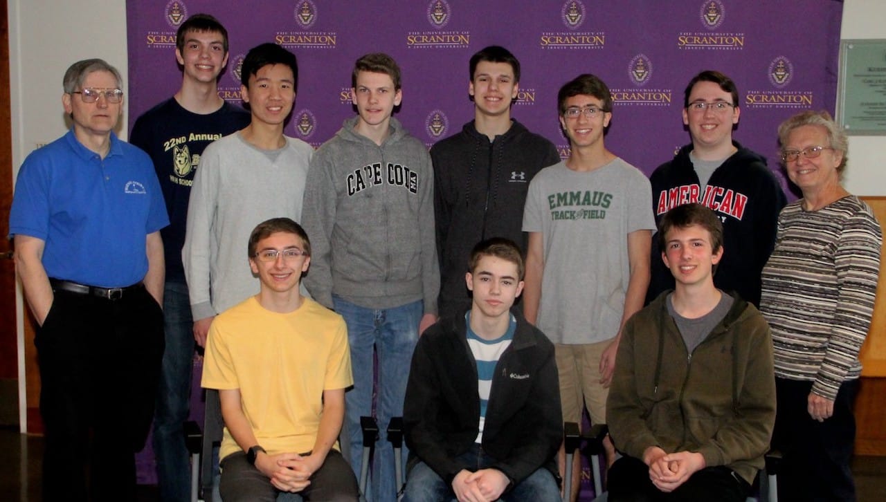 Teams from Emmaus High School came in first place and second place at The University of Scranton’s annual Computer Programming Contest. Front row, from left, are second place team members Cameron Fanning, Austin Moudy and Arti Schmidt. Standing are: Robert McCloskey, Ph.D., assistant professor of computing sciences; Nathan Bowler; Johnny Yang; and Ethan Knode; and first place team members Mitch Machulsky, Geoffrey Kleinberg and Aidan Levinson; and coach Carlen Blackstone.