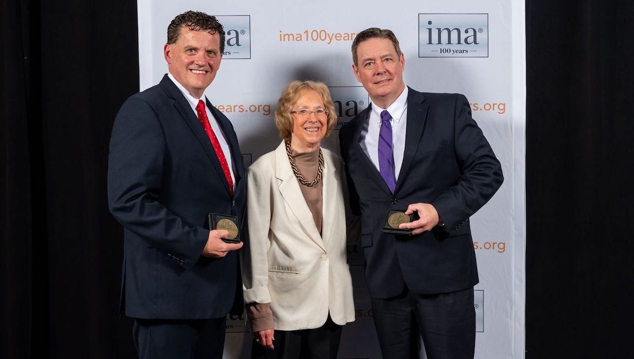 An article by University of Scranton accounting professors Douglas M. Boyle, D.B.A., James Boyle, D.B.A., and Daniel Mahoney, Ph.D., received the Institute of Management Accountants’ Lybrand Gold Medal as the “outstanding article of the year” for 2019. This is the fourth Lybrand Medal, and second gold medal, won by professors at Scranton. At the June award ceremony are, from left, Dr. James Boyle, Kathy Williams, editor-in-chief emeritus of Strategic Finance and Management Accounting Quarterly, and Dr. Douglas Boyle. Dr. Mahoney is absent from photo.