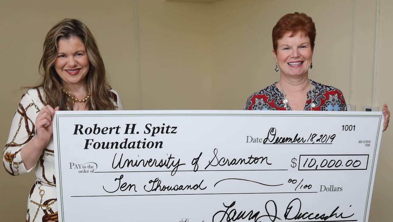 The University of Scranton received a $10,000 grant from the Robert H. Spitz Foundation to support its Business High School Scholars Program. From left are: Laura Ducceschi, CEO of the Scranton Area Community Foundation, administrator of Robert H. Spitz Foundation; and Margaret Hambrose, director of corporate and foundation relations at The University of Scranton.