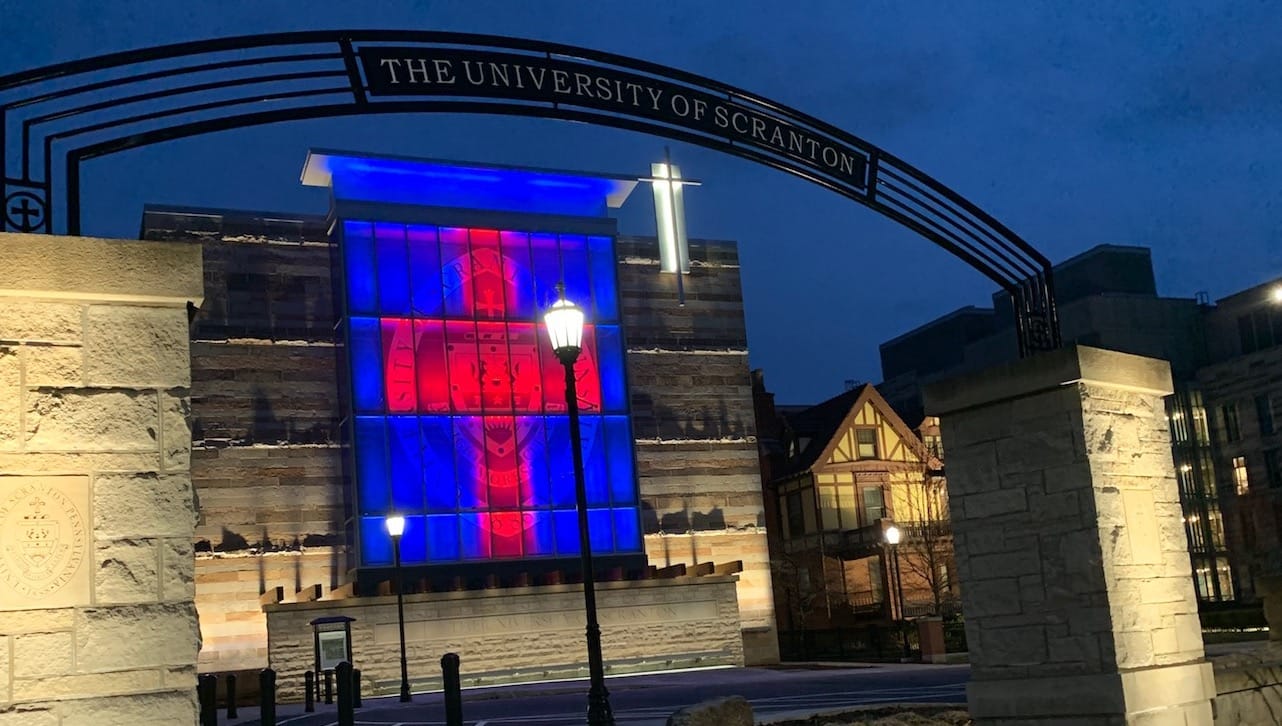 The University of Scranton will recognize World Autism Awareness Day’s “Light it Up Blue” (April 2) and National Autism Awareness Month (April). The University is honoring all those who are bravely and selflessly responding to COVID-19 by illuminating a red cross on a blue background on the St. Thomas Gateway.
