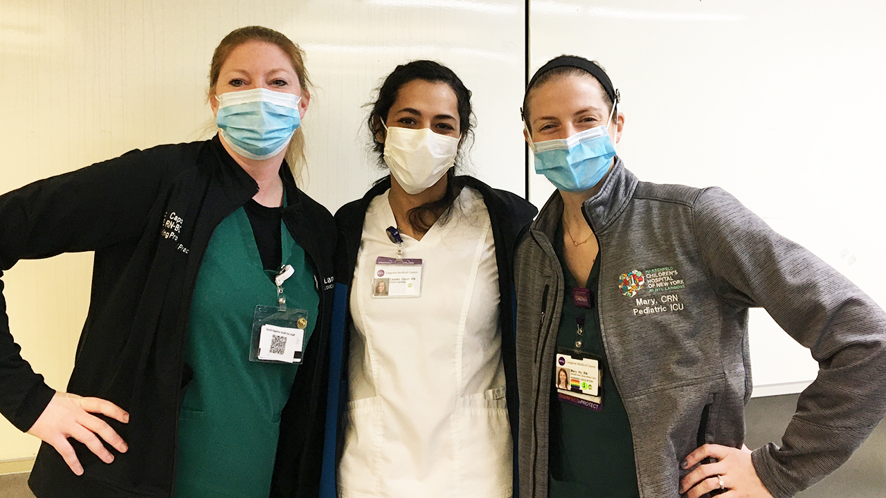 Three alumnae nurses work together at NYU Langone. From left: Liz Waldron Capobianco '01, Lauren Garel '17 and Mary Rose Ho '10.