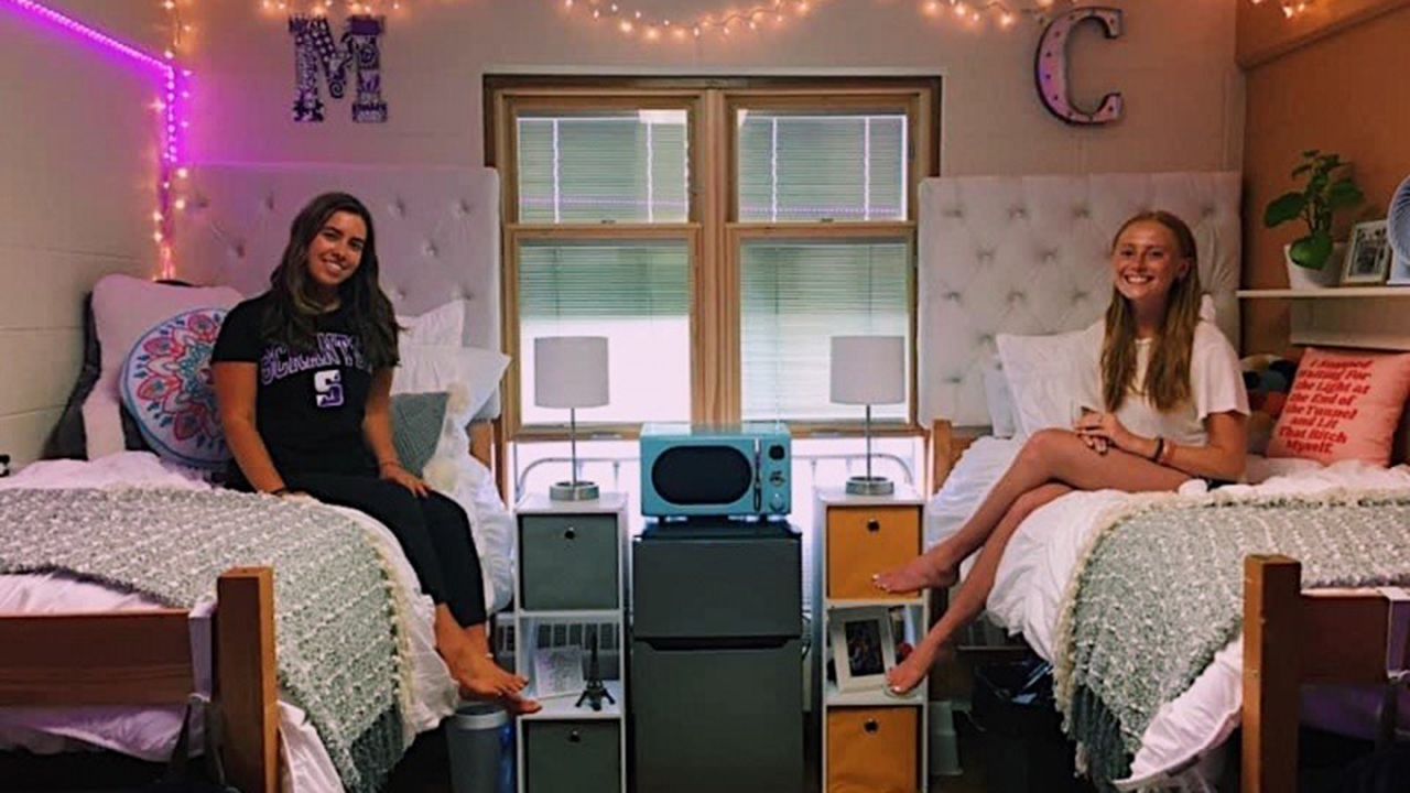 Roommates Maura Kranz (left) and Caitlin Doughton (right) in their dorm room.