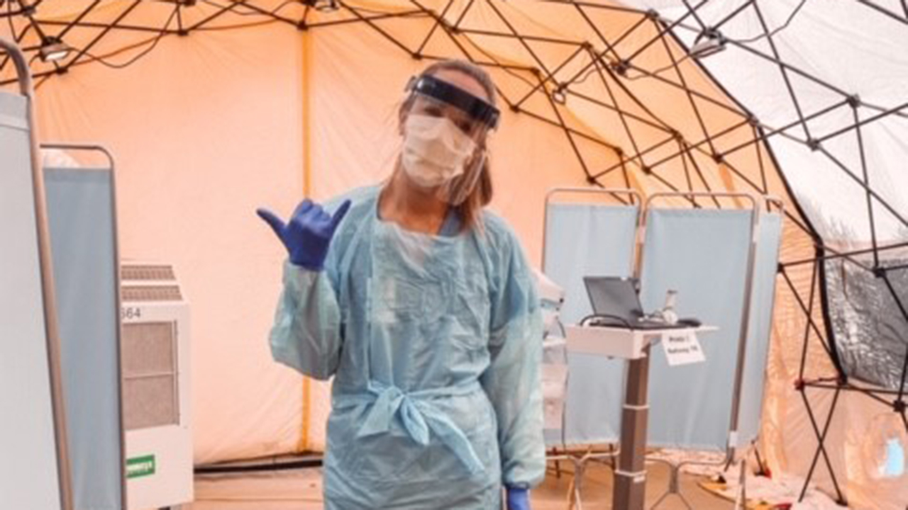 Loughlin spends long hours treating COVID patients in a tent outside The Queen's Medical Center in Honolulu.
