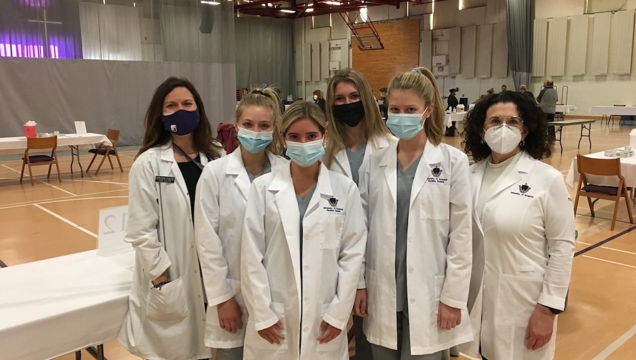 Students enrolled in The University of Scranton’s nursing program helped to administer vaccinations at a clinic on campus. From left: Autumn Forgione, clinical coordinator and assistant lab director at the University; nursing students Carly Oakes, Staten Island, New York; LilyAnne Stevens, Brick, New Jersey; Abigail Sheehan, Midland Park, New Jersey; Amanda Ring, Bridgewater, New Jersey; and Andrea Mantione, DNP, director of the Leahy Community Health and Family Center. More than 150 University nursing students and 12 Nursing Department faculty members and staff have volunteered to administer thousands of doses of COVID-19 vaccines at 15 clinics in NEPA.