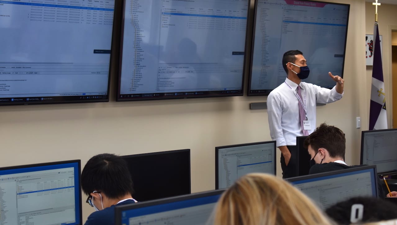 Sinchul Back, Ph.D., assistant professor the Department of Sociology, Criminal Justice and Criminology and director of cybercrime and cybersecurity at The University of Scranton, leads high school students participating in the Cybercrime Investigation Summer Camp through a simulation of a cyberattack (i.e. ransomware) on an airport. The camp was offered free-of-charge July 13-15 in the University’s Center for the Analysis and Prevention of Crime.