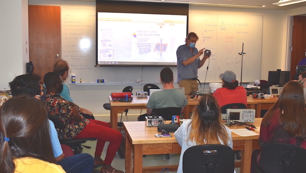 Declan Mulhall, Ph.D., professor of physics and engineering at The University of Scranton, introduced physics concepts of electricity and magnetism to high school students participating in a Phyisics Summer Camp. The camp, offered free-of-charge July 19-21 in the University’s Loyola Science Center, introduced students to an array of much-in-demand careers available to physicists.