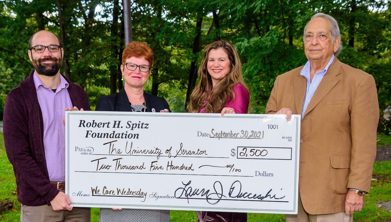 The University of Scranton received a $2,500 grant from the Robert H. Spitz Foundation to support its We Care Wednesday’s food donation program, which prepared and distributed more than 2,000 ready-to-eat meals to those in need. From left: Frank Caputo, grants and communications coordinator, Scranton Area Community Foundation; Meg Hambrose, director of corporate and foundation relations, The University of Scranton; Laura Ducceschi, president/CEO Scranton Area Community Foundation, administrator of Robert H. Spitz Foundation; and Jack Nogi, trustee, Robert H. Spitz Foundation.