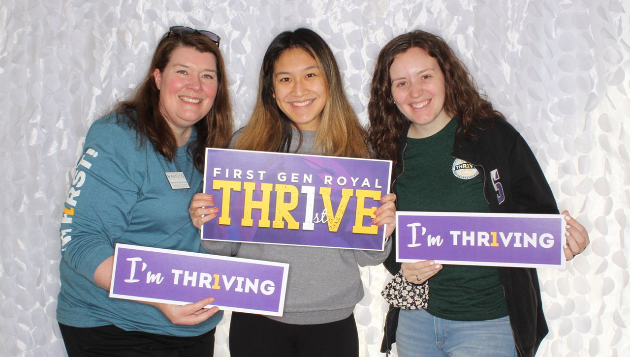 The University joined with colleges across the country to celebrateNational First-Generation College Student Day. From left: Shanon Murphy Fennie, Guide Peer Mentors Kayla Abcede and Ashley Walker. 