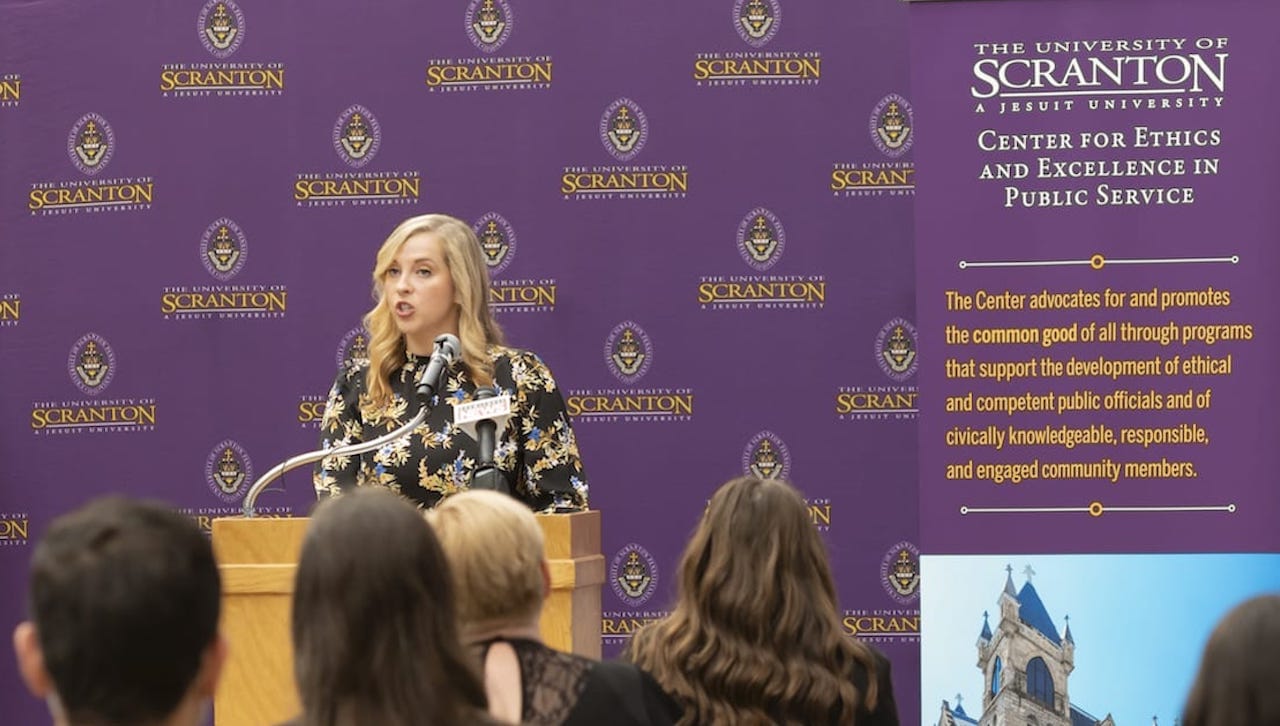 The University of Scranton will host the Inaugural Conference on Ethics and Excellence in Public Service on April 9 on the fifth floor of Brennan Hall. Reservations are required to attend the half-day conference offered by the University’s Center for Ethics and Excellence in Public Service (CEEPS). Pictured is JoyAnna Hopper, Ph.D., assistant professor of political science and co-director of CEEPS, speaking at the announcement of the opening of CEEPS on campus.