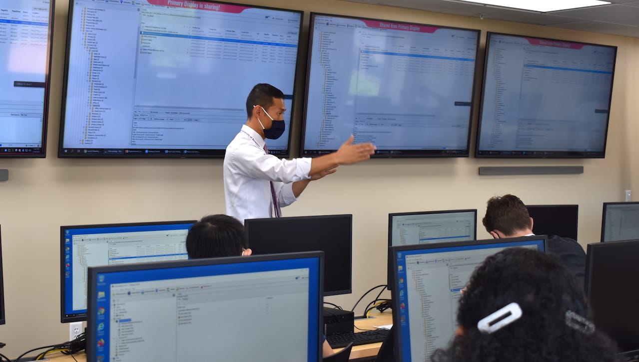 Sinchul Back, Ph.D., assistant professor the Department of Sociology, Criminal Justice and Criminology and director of cybercrime and cybersecurity at The University of Scranton, leads high school students participating in the University’s 2021 Cybercrime Investigation Summer Camp through a simulation of a cyberattack on an airport. The University, with support from the international defense and security company Jacobs, will offer the camp again this year on July 12-15 at no cost to the participants.