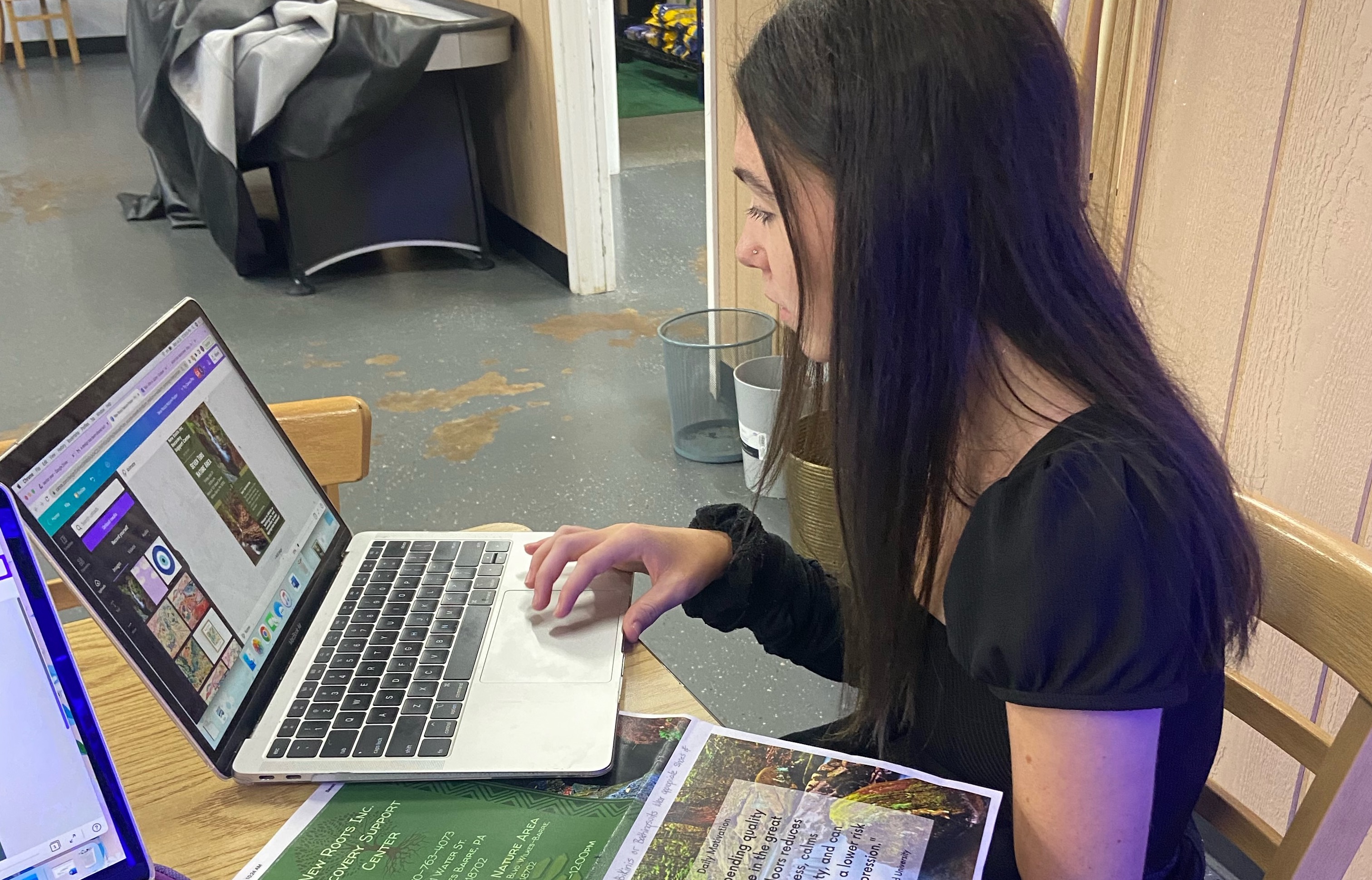 Occupational therapy major Erin Quinn '23, shown, inputs information about clients into a computer program as part of a 40-hour summer fieldwork assignment at New Roots Recovery Center in Wilkes Barre, PA.